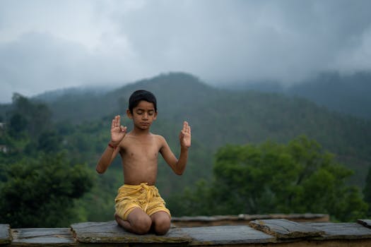 a person practicing yoga outdoors