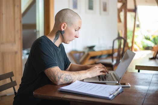 A person working focused at a desk